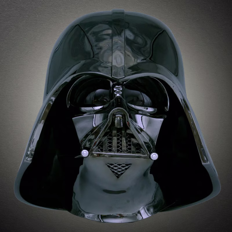 Front view of a glossy black Darth Vader helmet