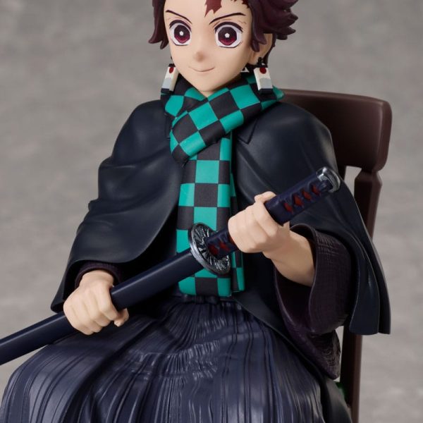 Tanjiro Kamado figure sitting in a chair with a checkered scarf and katana. Pending licensor's final approval