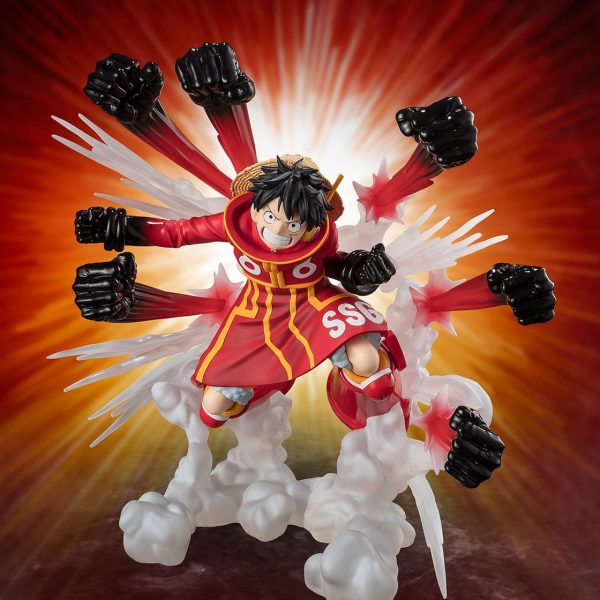 Monkey D. Luffy figure in a red Egghead Island outfit, performing a multi-fist attack with smoke and energy effects