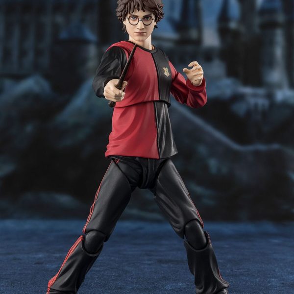 Harry Potter action figure in red and black Triwizard Tournament uniform holding a wand