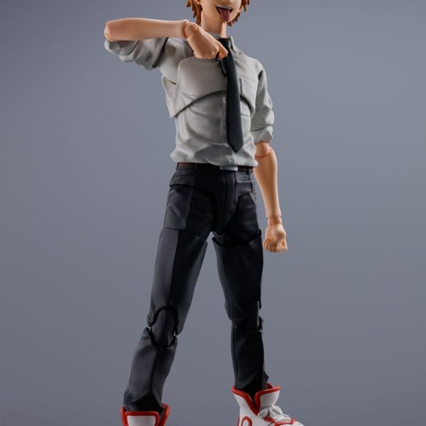 Denji action figure from Chainsaw Man sticking his tongue out, wearing a white shirt, black tie, and black pants