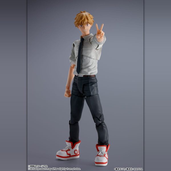 Denji action figure from Chainsaw Man in a white shirt and black tie, making a peace sign