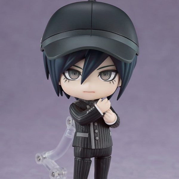 Shuichi Saihara Nendoroid figure wearing a black cap and pinstripe uniform, adjusting his sleeve