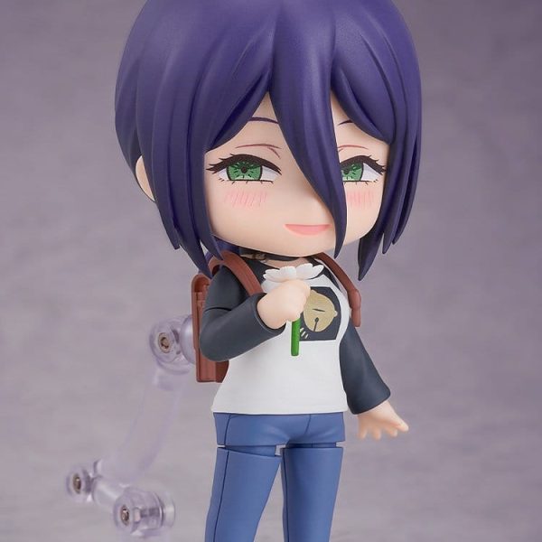 Nendoroid Reze figure with purple hair and green eyes, holding a white flower and wearing a backpack