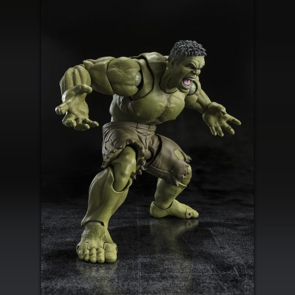 Articulated Hulk action figure in an aggressive crouching pose with arms outstretched and mouth open in a shout