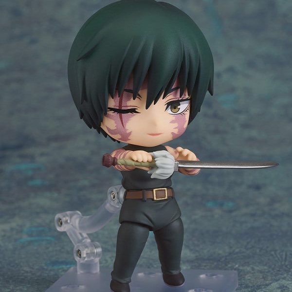 Maki Zenin Nendoroid figure with facial scars and short green hair, holding a sword in a combat pose