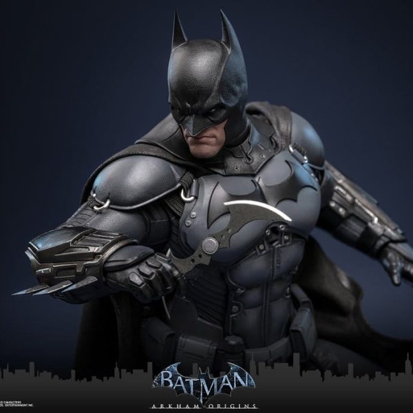 Batman Arkham Origins 1/6th scale collectible figure in armored suit holding a batarang