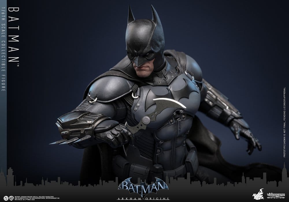 Batman Arkham Origins 1/6th scale collectible figure in armored suit holding a batarang