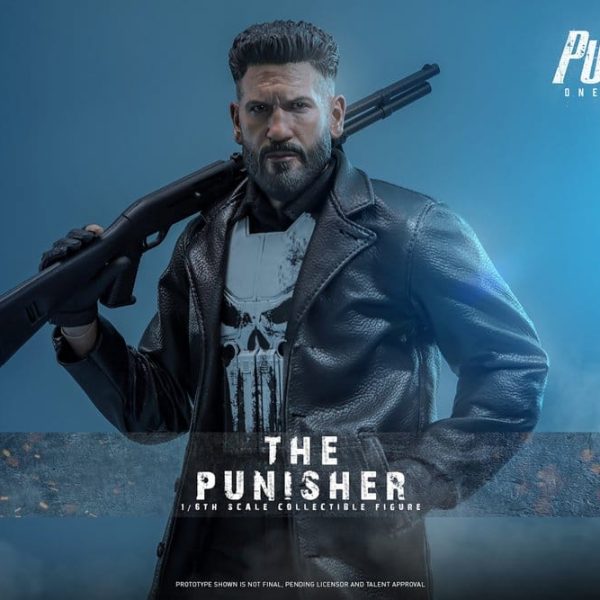 Hot Toys 1/6th scale collectible figure of The Punisher wearing a leather coat and skull vest, holding a shotgun
