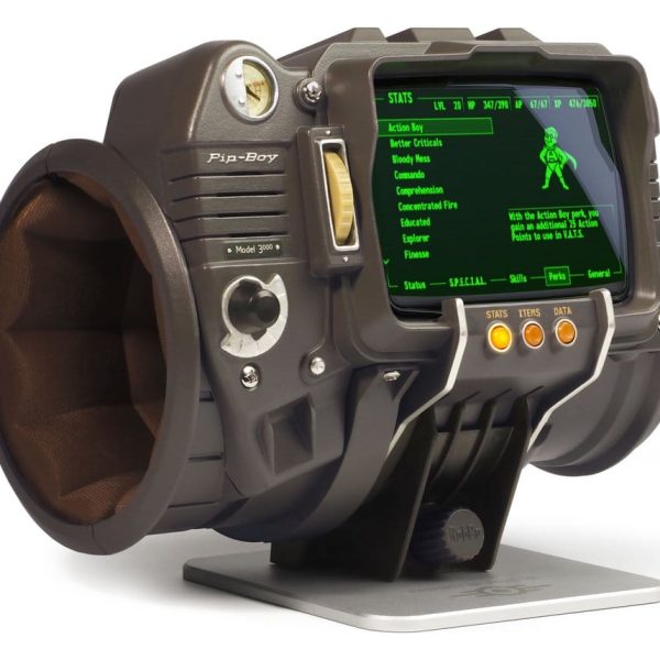 Fallout Pip-Boy 3000 replica — a die-cast green wrist computer with a glowing green screen on its machined metal display stand