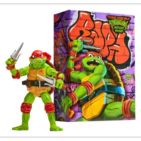 TMNT Mutant Mayhem Comic Con Raphael action figure with his sai, beside the graffiti-print display box